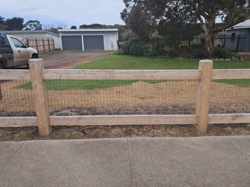 Two rail cypress fence with wire mesh at Deans Marsh